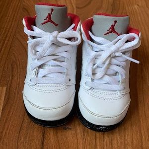 Kids Jordan high top tennis shoes